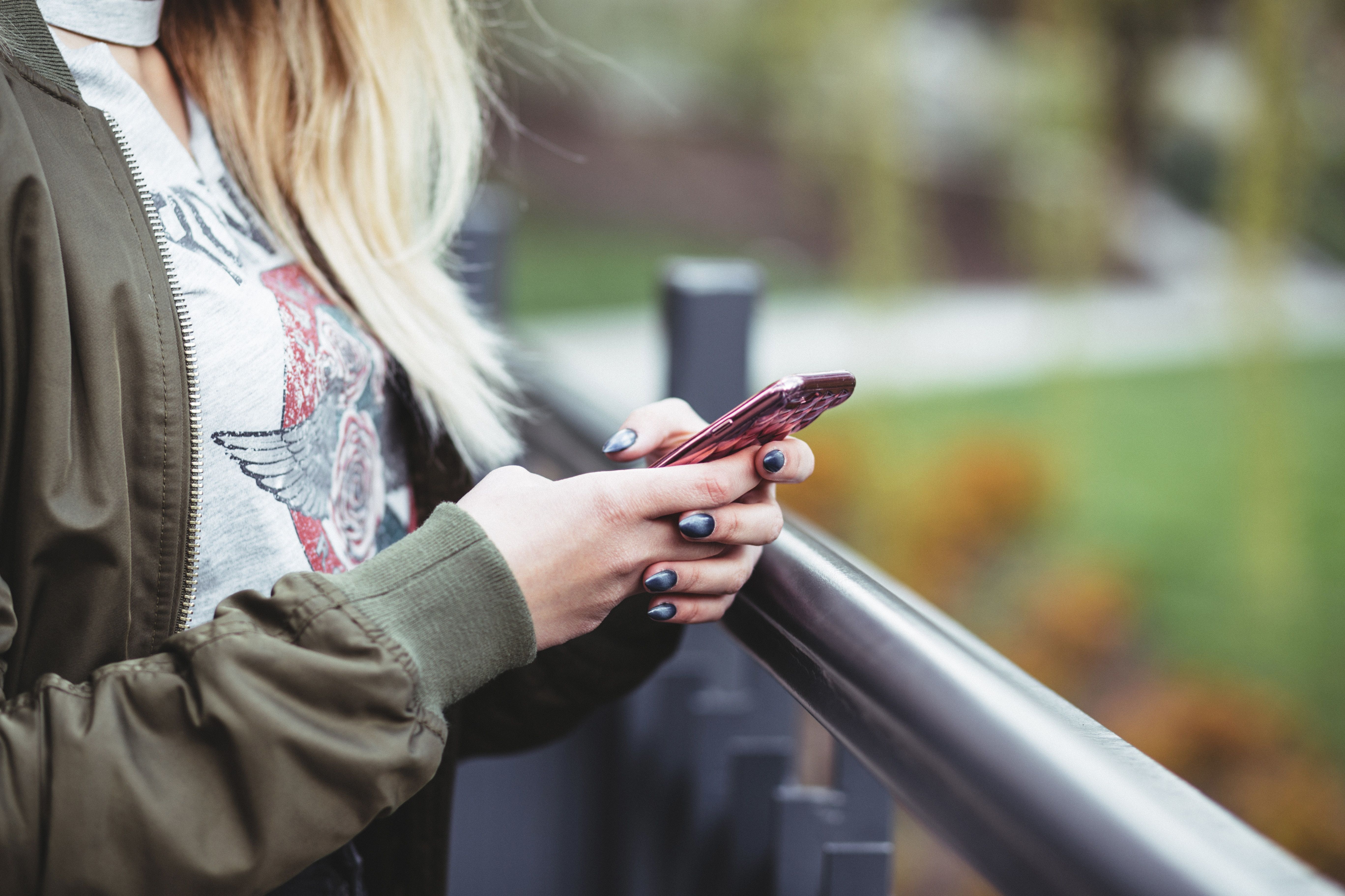 Woman texting for help about her traffic tickets