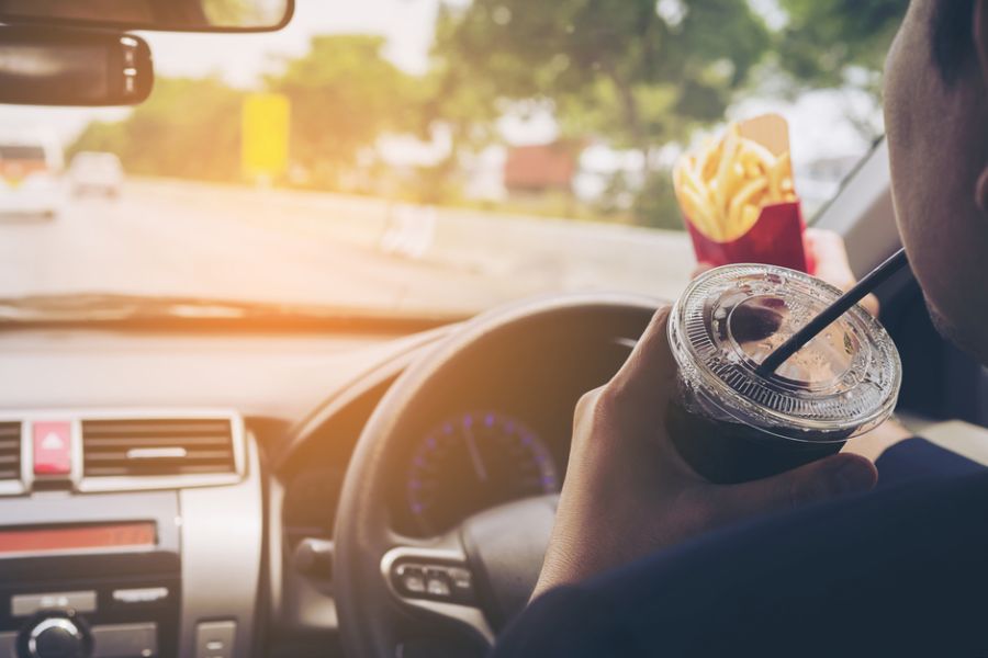 Man careless driving while eating